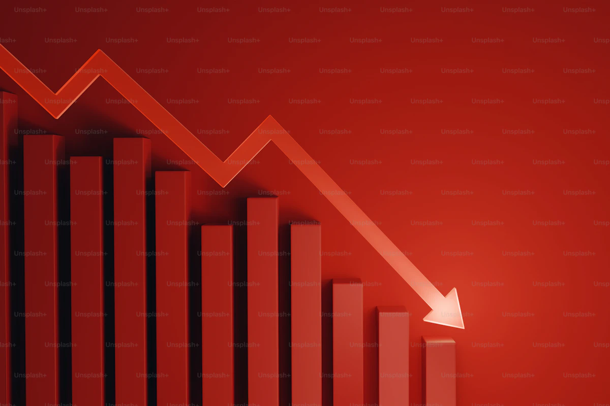 Red downward arrow over a declining bar graph, representing the revenue impact of TrueCoach's new 5% transaction fee